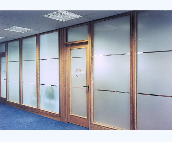 Frosted privacy window film fitted to glazing in office